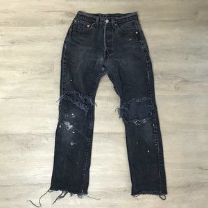 Vintage 90s distressed Levi's 501s straight leg high rise jeans in washed black